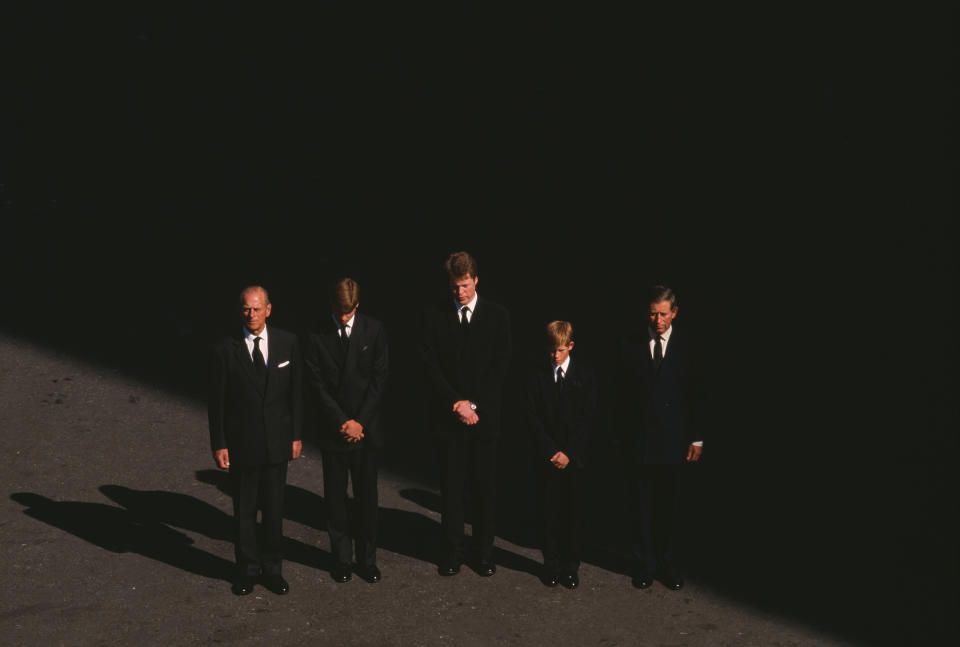Prince Philip stands with Prince William, Earl Charles Spencer, Prince Harry and Prince Charles at the funeral of Princess Diana, on Sept. 6, 1997.<span class="copyright">Robert Wallis—Corbis/Getty Images</span>