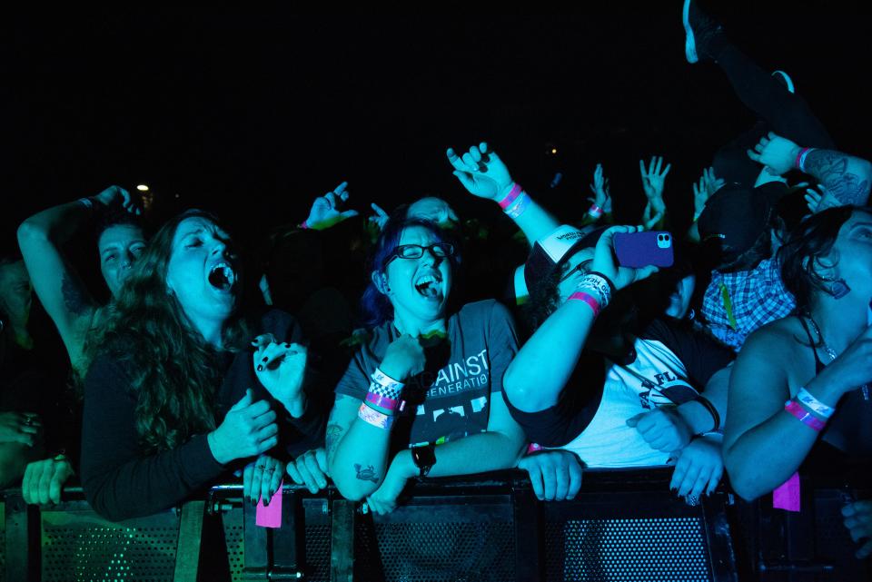 Audience members cheer and sing along with The Menzingers during The Fest in Gainesville, Fla., on Friday, Oct. 28, 2022.