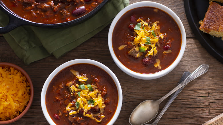 bowls of chili with cheese