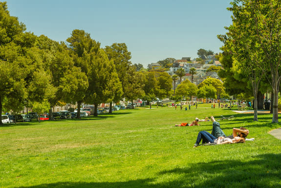 These San Francisco sunbathers may not know it, but spring is losing about 30 seconds every year.