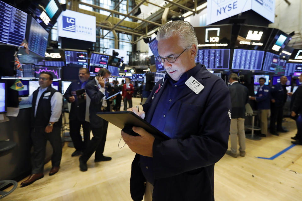 Trader Frank O'Connell works on the floor of the New York Stock Exchange, Friday, Aug. 16, 2019. Stocks are opening broadly higher at the end of a turbulent week. (AP Photo/Richard Drew)