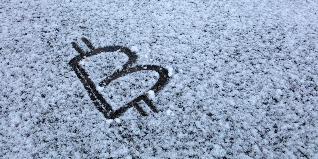 Bitcoin sign on snow