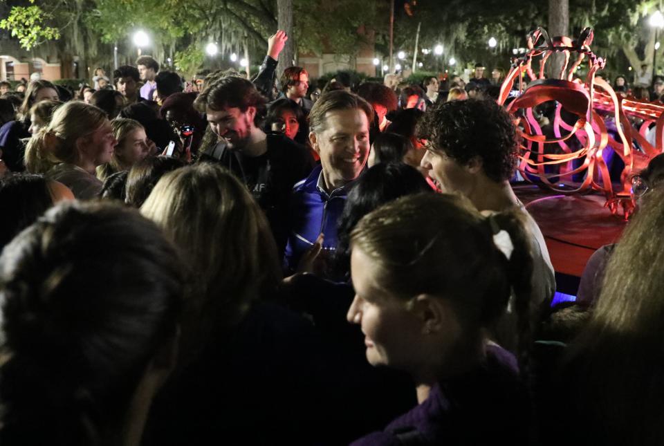 University President Ben Sasse mingles with University of Florida students and community members after the Lighting of the Holiday Gator at the University of Florida on Nov. 30, 2023.
