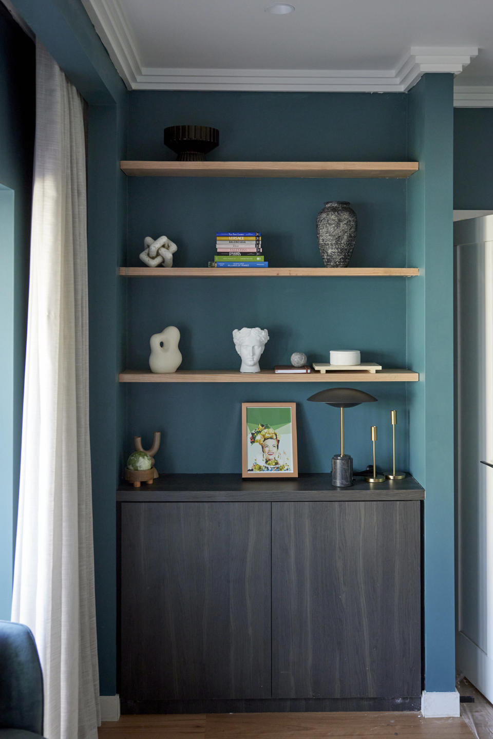 A bold shelf with trinkets. 