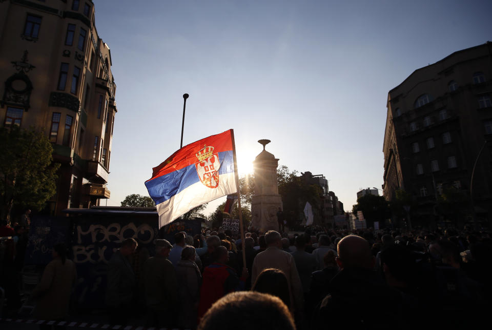 Protesters gathering at Terazije square during a protest against populist president Aleksandar Vucic in Belgrade, Serbia, Saturday, April 20, 2019. Thousands of people have rallied in Serbia's capital for 20th week in a row against populist President Aleksandar Vucic and his government. (AP Photo/Darko Vojinovic)