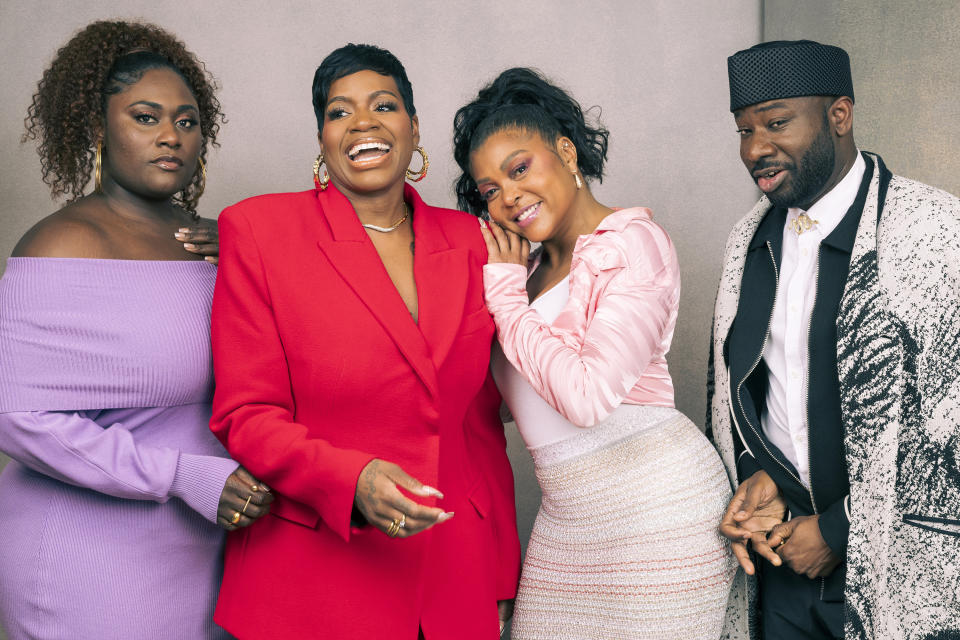 Danielle Brooks, from left, Fantasia Barrino, Taraji P. Henson and Blitz Bazawule pose for a portrait to promote the film "The Color Purple" on Thursday, Dec. 7, 2023, in Los Angeles. (Photo by Willy Sanjuan/Invision/AP)