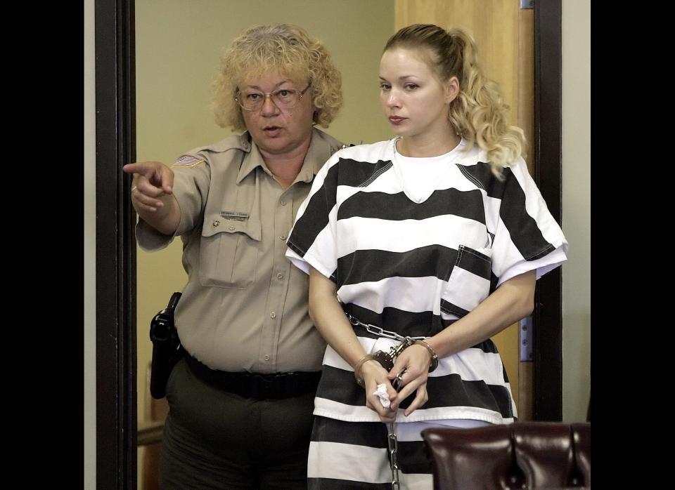 This July 14, 2006 photo shows Pamela Joan Turner, right, being escorted into circuit court in McMinnville, Tenn. The Tennessee Supreme Court said that it will not hear the appeal. Turner was convicted of having sex with a 13-year-old student at the Warren County school where she taught and then again convicted of sending that same student inappropriate photos and videos of herself. (AP Photo/Mark Humhrey)