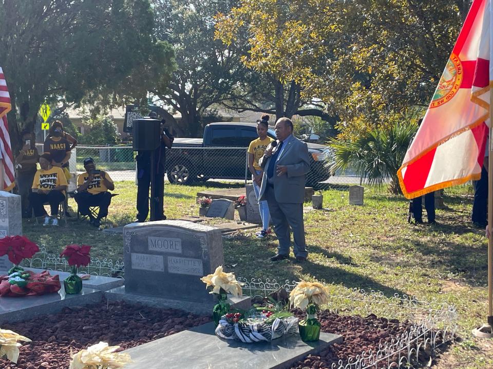 Leon Russell, chair of the NAACP's National Board of Directors, spoke Saturday at LaGrange Cemetery near Titusville for the annual Harry T. and Harriette V. Moore gravesite service.