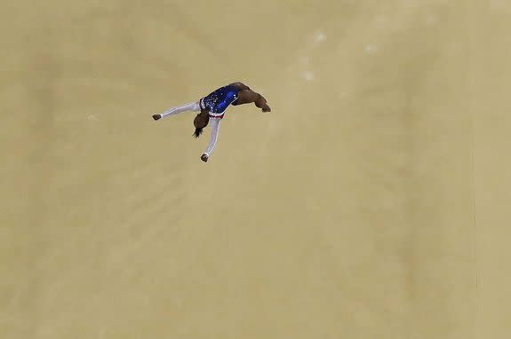 United States' Simone Biles performs on the floor during the artistic gymnastics women's individual all-around final at the 2016 Summer Olympics in Rio de Janeiro, Brazil, Thursday, Aug. 11, 2016. (AP Photo/Morry Gash)