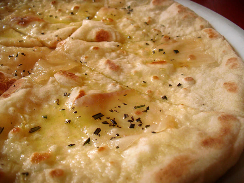 <b>New York: Lardo Pizza</b> This pizza from Otto in New York City is topped with cured pork fat.<br> <br> (Image courtesy <a href="http://www.phudenyc.com/" rel="nofollow noopener" target="_blank" data-ylk="slk:Kerry Alaric Cheeseboro for PHUDE-nyc.com;elm:context_link;itc:0;sec:content-canvas" class="link ">Kerry Alaric Cheeseboro for PHUDE-nyc.com </a>)