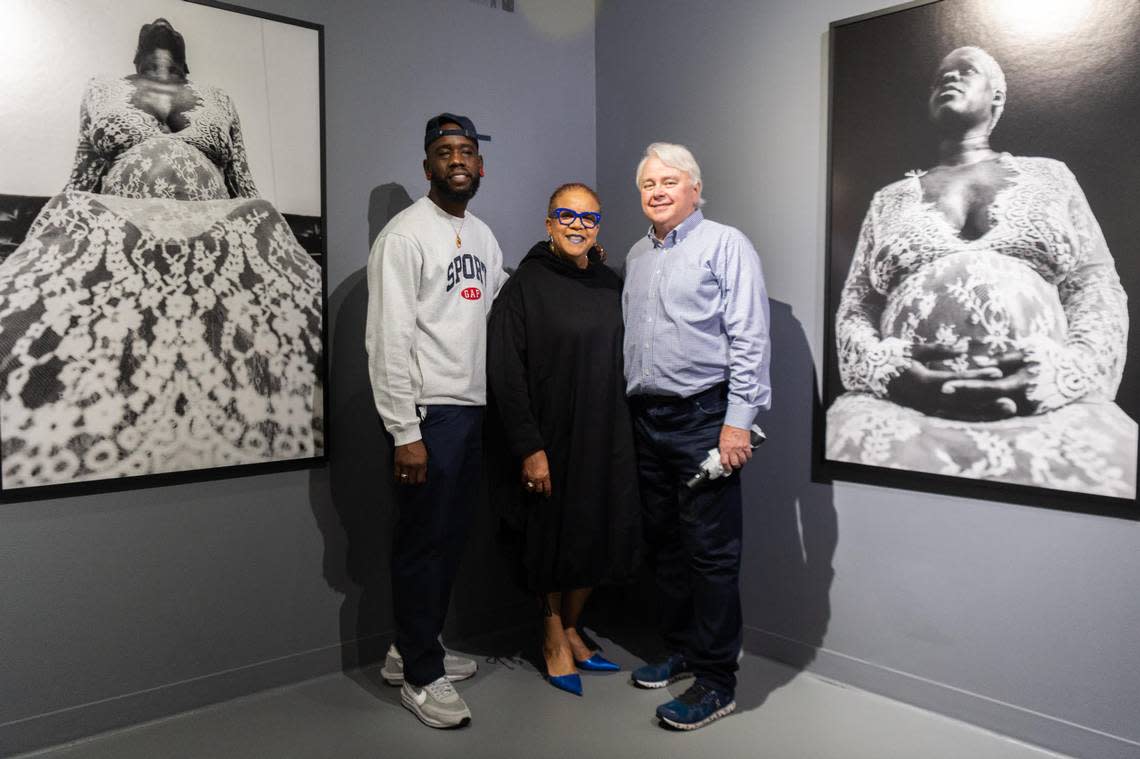 Roscoè B. Thické III, curator Rosie Gordon-Wallace, and Dennis Scholl president and CEO of Oolite Arts in front of “Absolute,” which expresses the power and beauty of Thické’s pregnant friend in a stylized photo shoot.