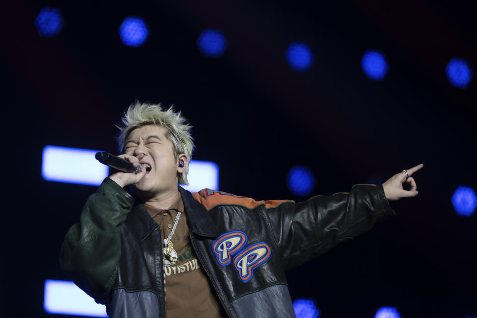 Chinese rapper Wang Yitai performs at a concert in Chengdu in southwestern China's Sichuan province, Saturday, March 16, 2024. Wang Yitai, who was a member of Chengdu's rap collective CDC, is now one of the most popular rappers in China today. His style has infused mainstream pop sounds, than the heavy "trap" music Chengdu is known for. (AP Photo/Ng Han Guan)