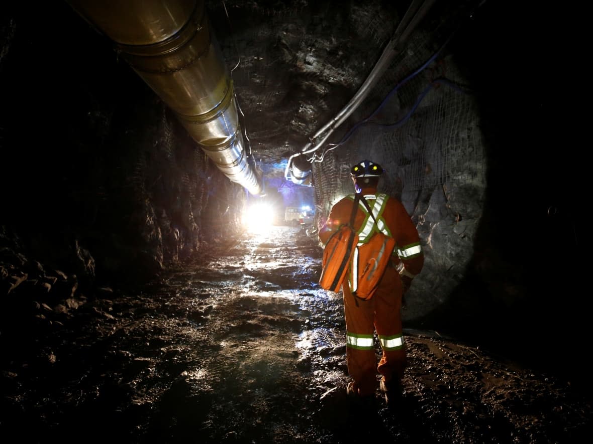 A worker walks underground at Goldcorp Inc's Borden all-electric gold mine near Chapleau, Ont. More mines in Canada are transitioning from diesel-powered to electric equipment. (Chris Wattie/Reuters - image credit)