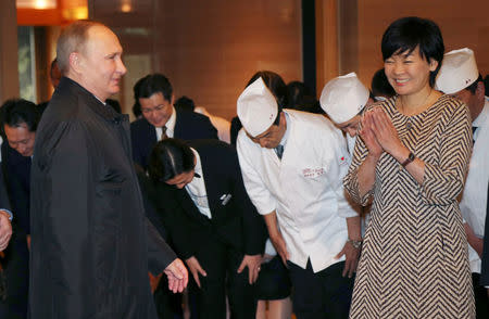 Akie Abe, wife of Japan's Prime Minister Shinzo Abe, sees Russian President Vladimir Putin off to Tokyo from a hot spring villa in Nagato, western Japan, Dec. 16, 2016. REUTERS/Koji Sasahara/Pool