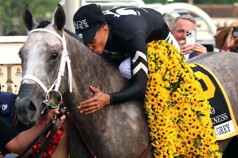 Seize the Grey gets a kiss from jockey Jaime Torres in the winner's circle after capturing the 149th running of the Preakness Stakes at Pimlico Race Course on Saturday Baltimore. Photo by Mark Abraham/UPI