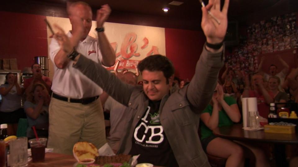 Adam Richman preparing for The Big Ugly Burger challenge