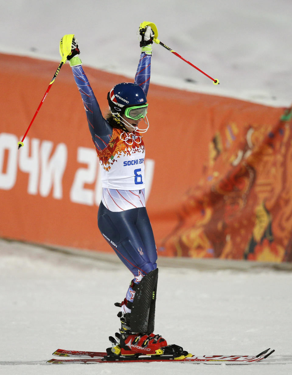 Gold medal winner Mikaela Shiffrin of the United States celebrates as she finishes the second run of the women's slalom at the Sochi 2014 Winter Olympics, Friday, Feb. 21, 2014, in Krasnaya Polyana, Russia.(AP Photo/Christophe Ena)