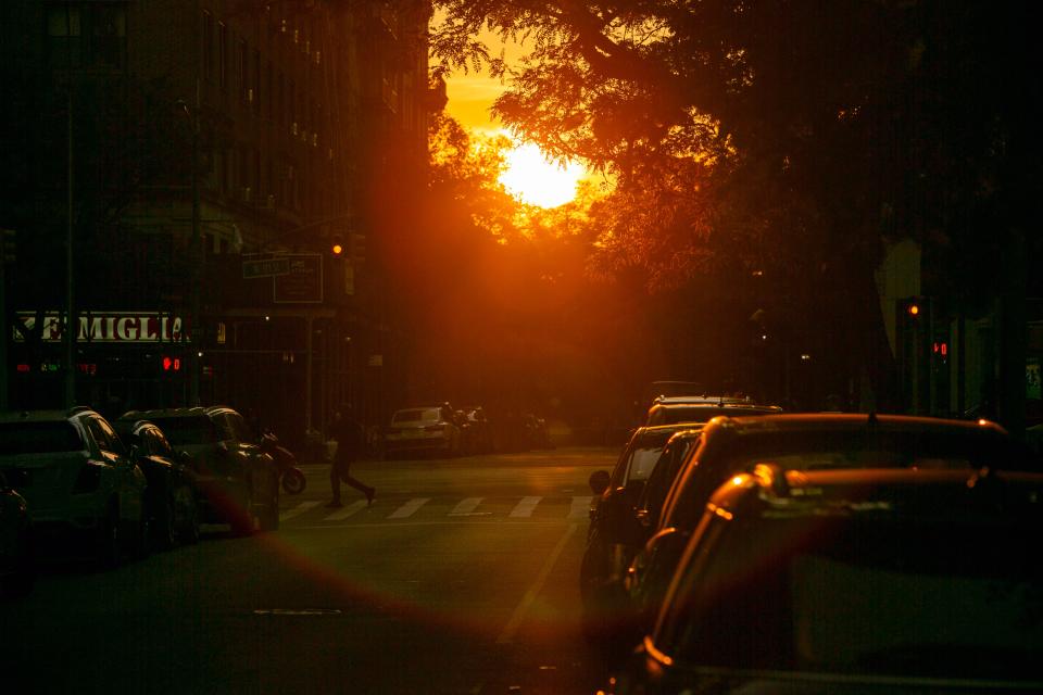 A Manhattanhenge sunset is visible in the Morningside Heights area of the borough of Manhattan in New York City on Monday, July 11, 2022.