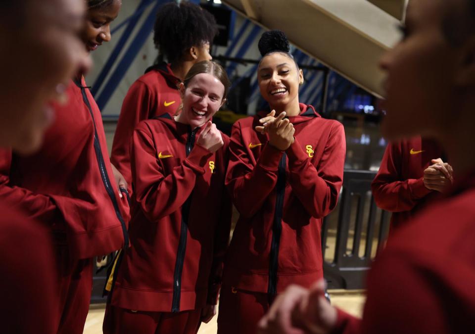 USC freshman guard Juju Watkins stands with her teammates before a recent game at Long Beach State.