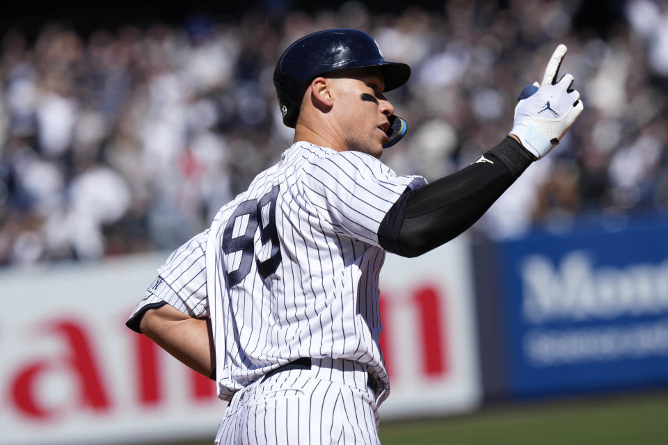 New York Yankees' Aaron Judge reacts after hitting a solo home run during the first inning of a baseball game against the San Francisco Giants at Yankee Stadium Thursday, March 30, 2023, in New York. (AP Photo/Seth Wenig)