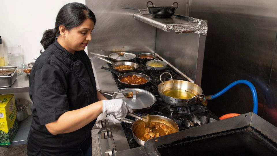 Swapna Sagdeo, who co-owns Nagpuri Saoji restaurant in Voorhees with her husband Neeraj Sagdeo, cooks in the kitchen of her restaurant.  Nagpuri Saoji is the only restaurant in the United States that serves Saoji cuisine.  Saoji is a cuisine invented by the weaver community of Nagpur, a city in the central Indian state of Maharashtra.