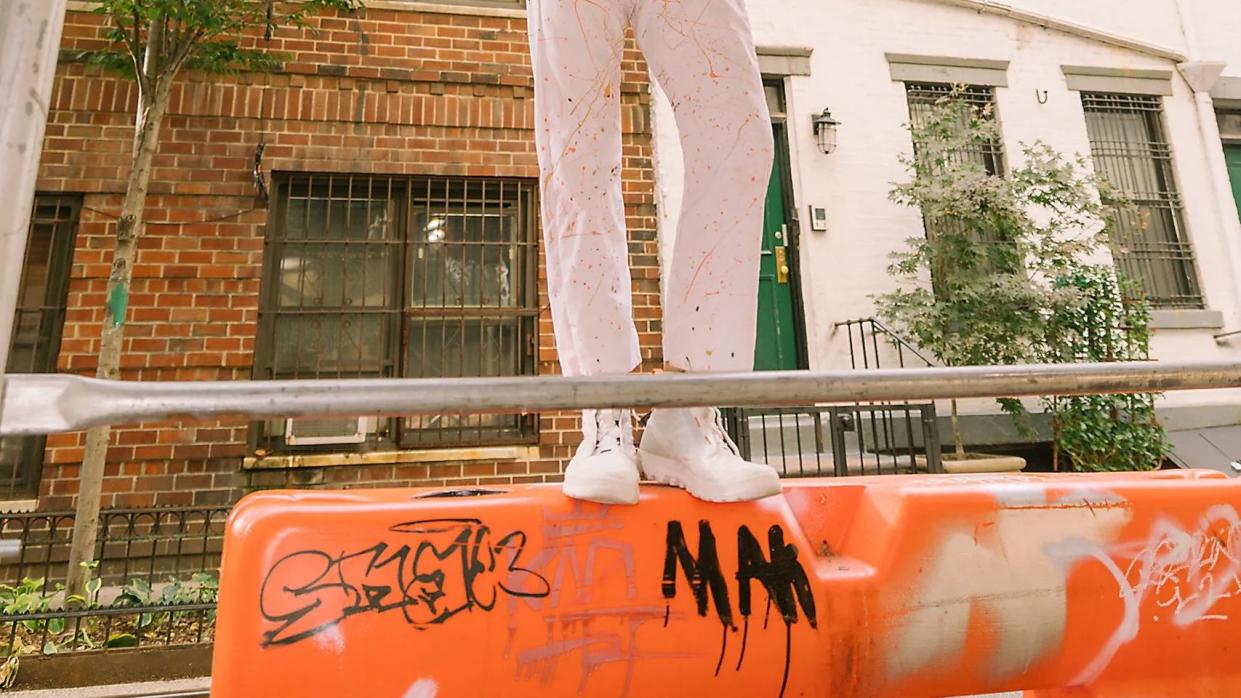 a person standing on a railing