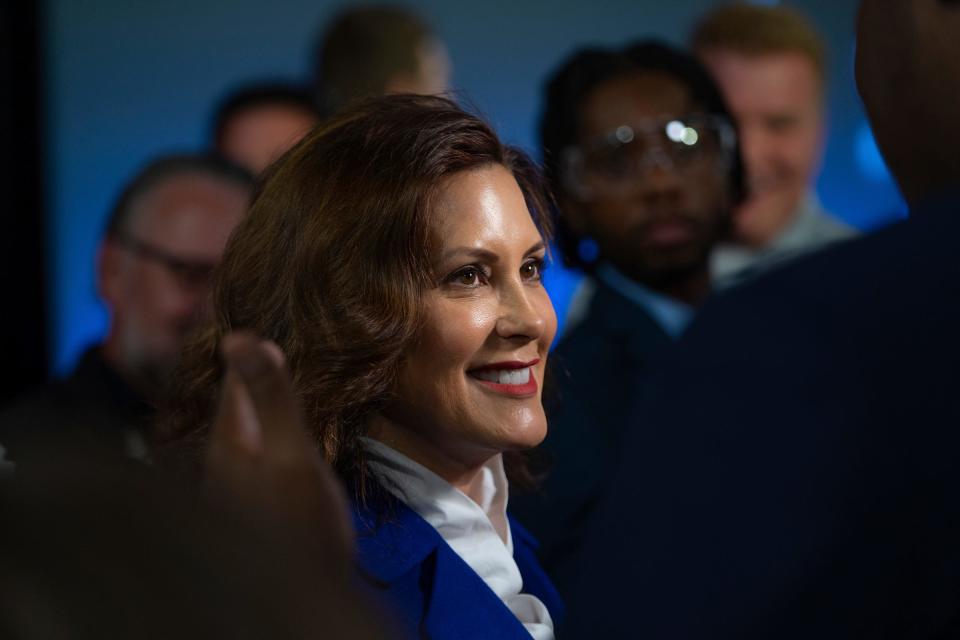 Michigan Gov. Gretchen Whitmer talks with the news media after an announcement of a multimillion-dollar investment into General Motors Flint Assembly while speaking to employees with other officials in the Flint plant on Monday, June 5, 2023.