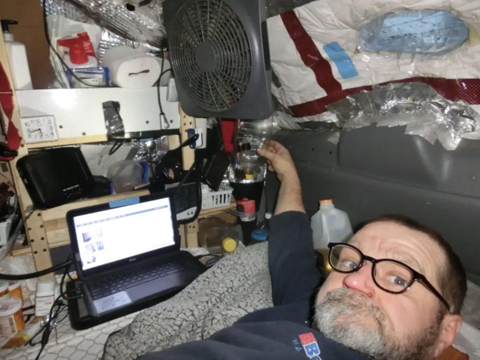 Slocum inside his van.