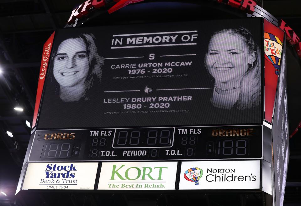 Images of Carrie Urton McCaw and Lesley Drury Prather were shown during the U of L-Syracuse game at the Yum Center in Louisville, Ky. on Feb. 19, 2020.  They were killed in an auto accident in St. Louis along with their daughters as they traveled to a volleyball tournament in Kansas City, Missouri. 