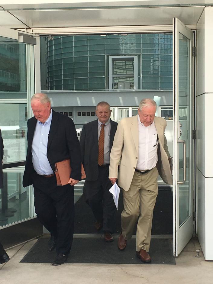 Backpage.com founders James Larkin (left) and Michael Lacey (right) as they leave federal court in Phoenix on April 30, 2018.