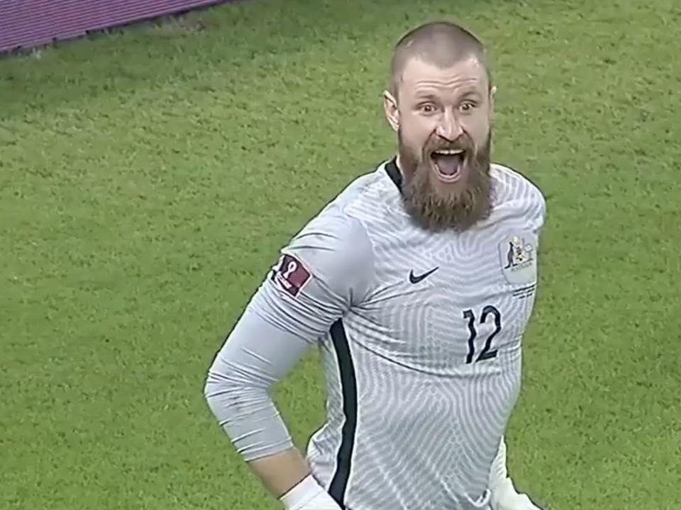 Australian goalkeeper Andrew Redmayne celebrates a save against Peru.