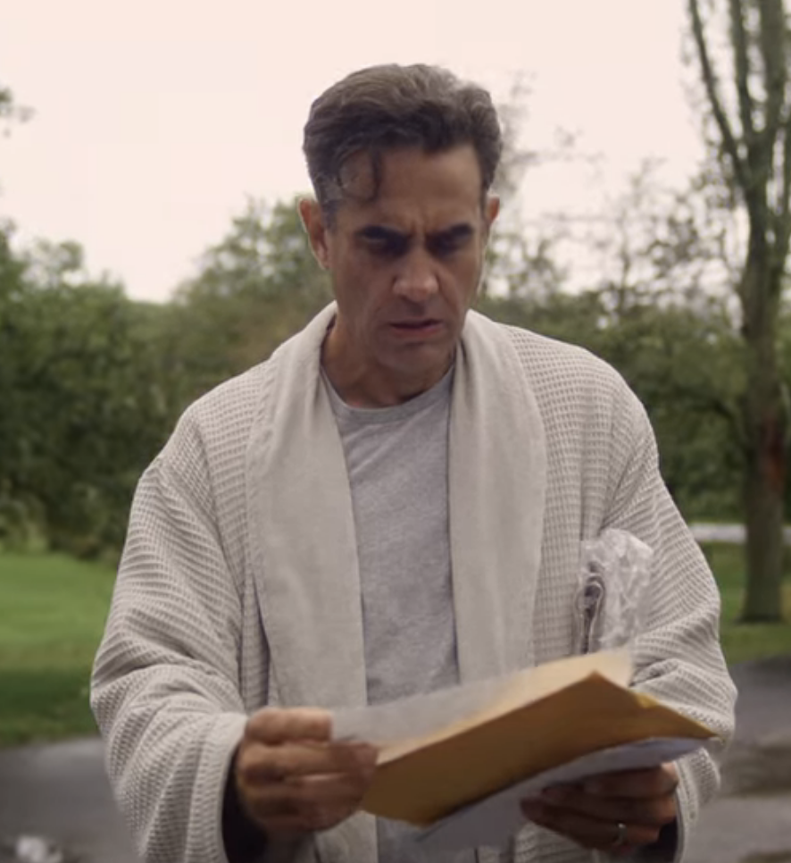 Cannavale in "The Watcher" opening mail