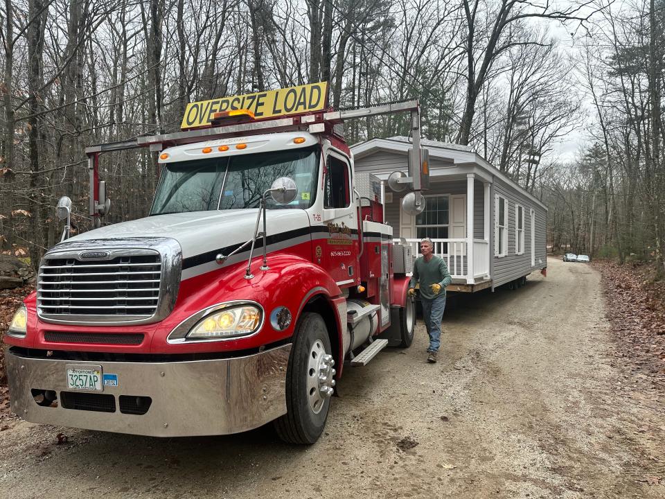 A new 2023 one-bedroom, 48-by-14-foot Eagle River Special mobile home was pulled into Vietnam War veteran Tom Barr's home on Punkintown Road in Eliot. Barr, a former Eliot police chief, saw his home damaged this year by rainwater and black mold.