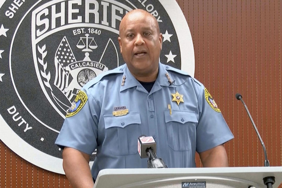 This image made from video provided by KPLC shows Calcasieu Parish Sheriff Gary “Stitch” Guillory speaking at a press conference Tuesday, July 9, 2024. Guillory said a 1-year-old “miracle baby” survived two days of sometimes stormy weather before a truck driver spotted him crawling along a roadside the day after his 4-year-old brother was found dead and his mother was arrested in Mississippi. (KPLC via AP)