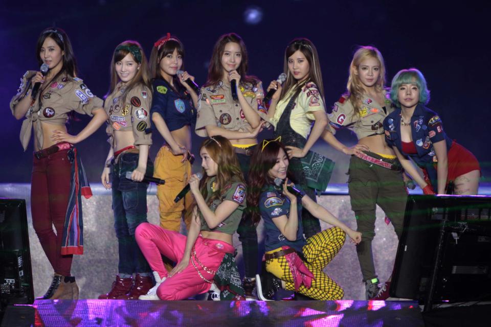 Kpop group "Girls Generation" performs for the crowd during the "Dream Kpop Fantasy Concert" held at the Mall of Asia grounds in Pasay city, south of Manila on 19 January 2013.