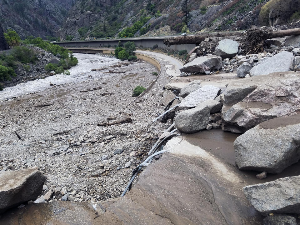 This image provided by the Colorado Department of Transportation shows mud and debris on U.S. Highway 6, Sunday, Aug. 1, 2021 west of Silver Plume, Colo. Mudslides closed some Colorado highways as forecasters warned of potential flash flooding on Sunday across the Rocky Mountain and Great Basin regions. (Colorado Department of Transportation via AP)