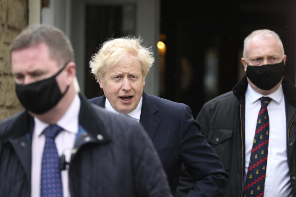 British Prime Minister Boris Johnson leaves after speaking to the media with Conservative Party candidate Jill Mortimer, who won the Hartlepool by-election, at Hartlepool Marina, in Hartlepool, north east England, Friday, May 7, 2021. Britain's governing Conservative Party made further inroads in the north of England on Friday, winning a by-election in the post-industrial town of Hartlepool for a parliamentary seat that the main opposition Labour Party had held since its creation in 1974. (AP Photo/Scott Heppell)