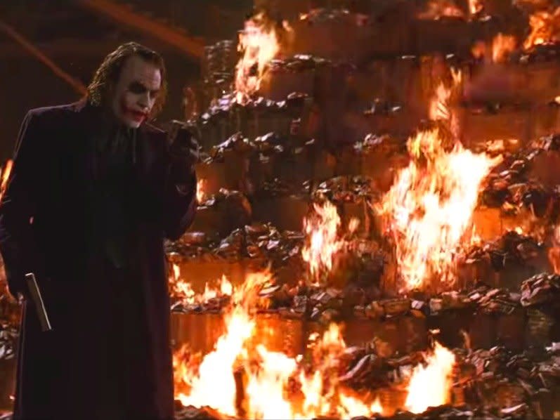 joker fire cash dark knight batman money burn