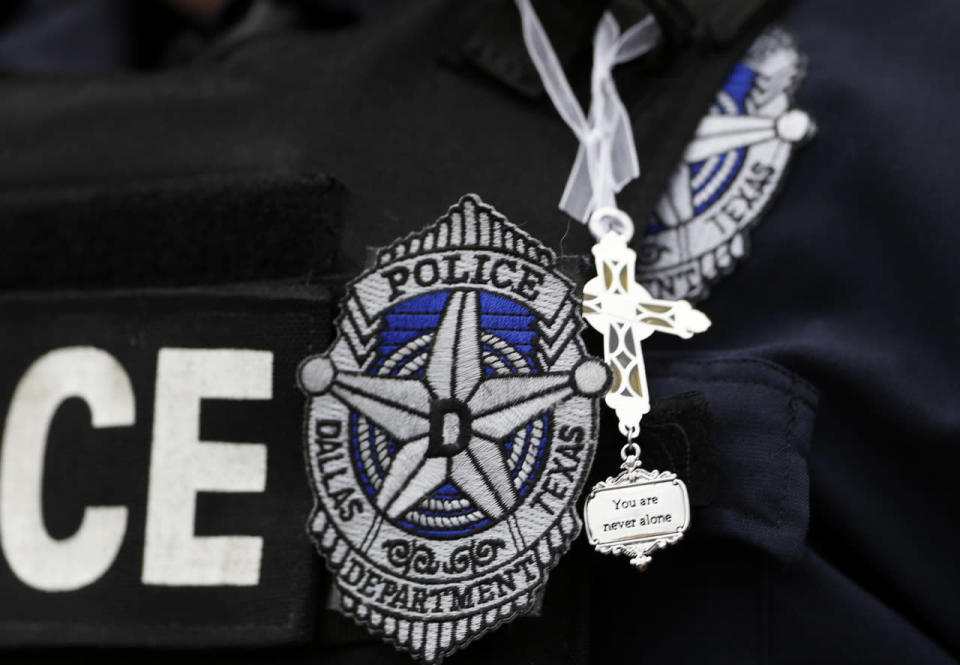 Dallas Police Sr. Corp. Kimberly Howard wears a cross