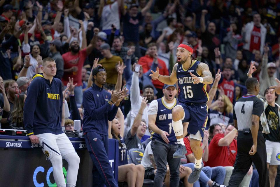 New Orleans Pelicans guard Jose Alvarado (15) celebrates a three point basket in the second half of an NBA basketball game against the Denver Nuggets in New Orleans, Sunday, Dec. 4, 2022. (AP Photo/Matthew Hinton)