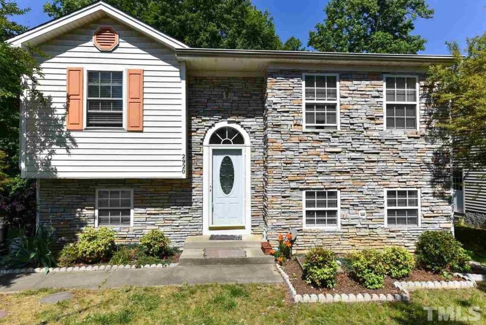 Three-bedroom, two-bathroom house with 1,676 square feet for sale in southeast Raleigh, built in 1999.