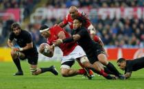 Rugby Union - New Zealand v Tonga - IRB Rugby World Cup 2015 Pool C - St James' Park, Newcastle, England - 9/10/15 New Zealand's Ma'a Nonu in action with Tonga's Lua Lokotui (L) Action Images via Reuters / Lee Smith