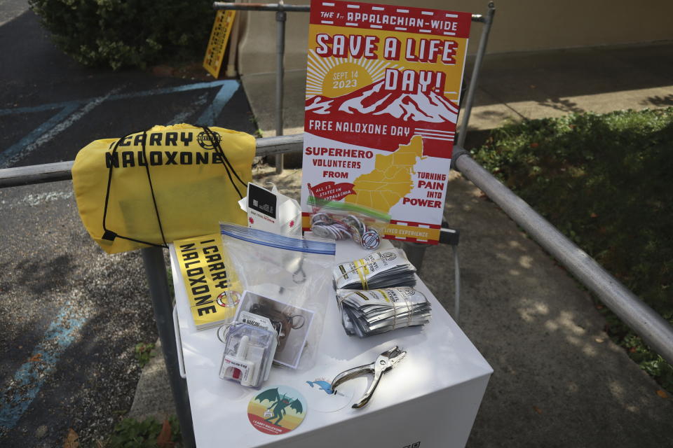 Materials prepared for the first-ever Appalachian "Save a Life Day" naloxone distribution event are displayed on a free Narcan access box on Monday, Sept. 11, 2023, in the parking lot of the Unitarian Universalist Congregation of Charleston in Charleston, W.Va. (AP Photo/Leah Willingham)