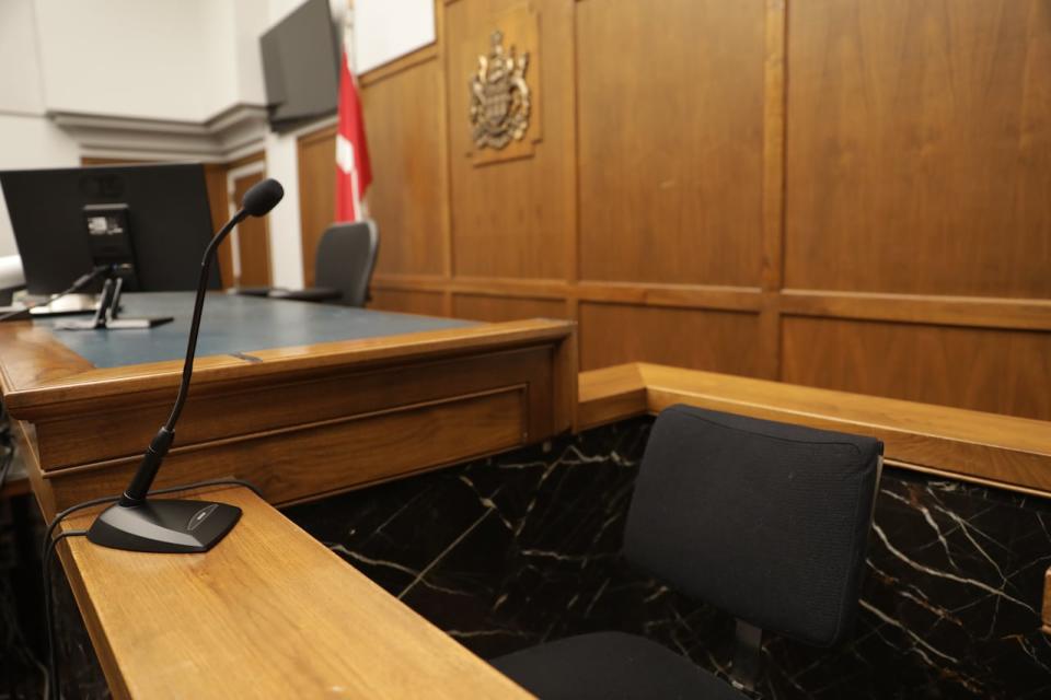 File - An empty witness box in a courtroom at Court of King's Bench in Regina, Sask.