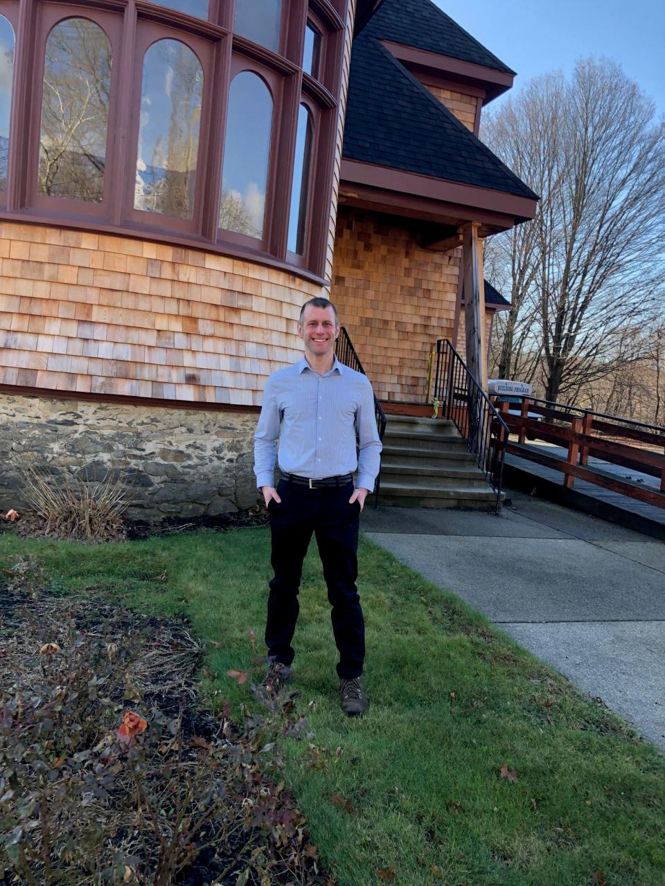 Mark Procknik, who will be starting as the Dighton Public Library's new director on Monday, Dec. 18, 2023, is seen here at Smith Memorial Hall on Main Street, which is being renovated as the new home of the library.