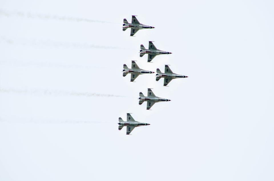 The U.S. Air Force Thunderbirds fly above Falcon Stadium at the U.S. Air Force Academy during the graduation airshow, May 26, 2021.