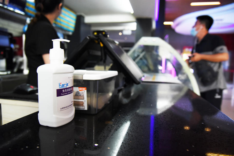 JINAN, July 20, 2020 -- Employees work at a movie theater which has reopened in Jinan, east China's Shandong Province, July 20, 2020.   Some movie theaters have reopened on Monday in Jinan on the premise that proper prevention and control measures have been put into place. (Photo by Wang Kai/Xinhua via Getty) (Xinhua/Wang Kai via Getty Images)