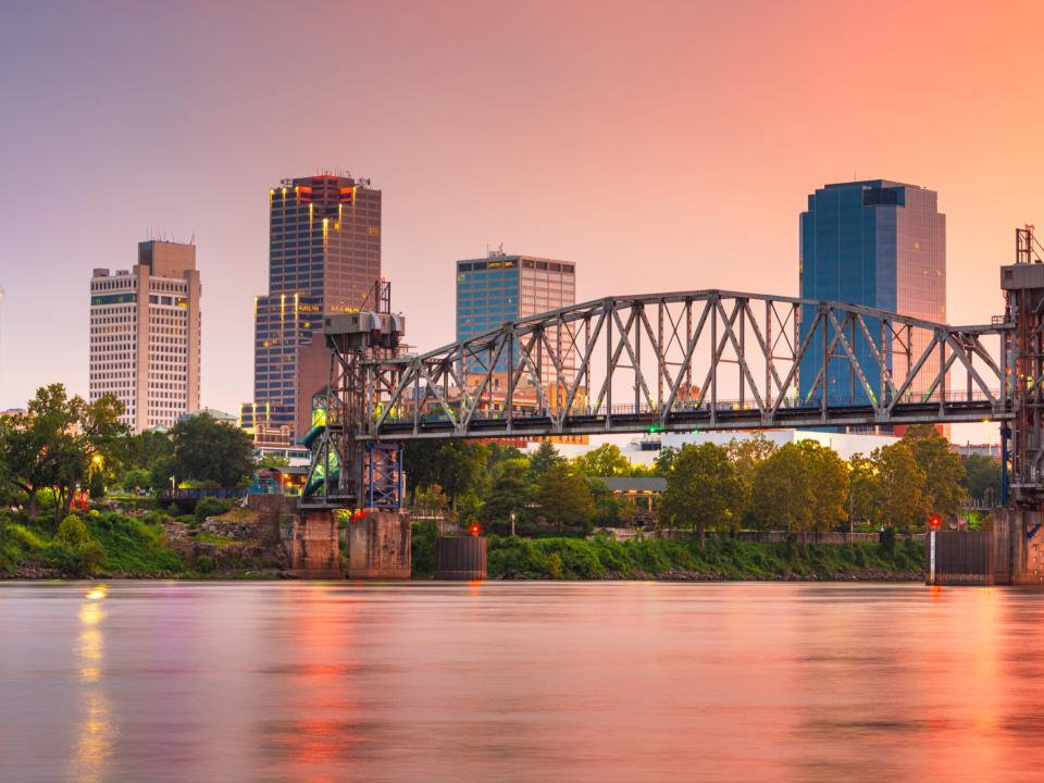 Little Rock, Arkansas, skyline on the river at twilight.