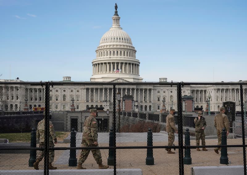 National Guard soldiers maintain a watch over the U.S. Capitol in Washington