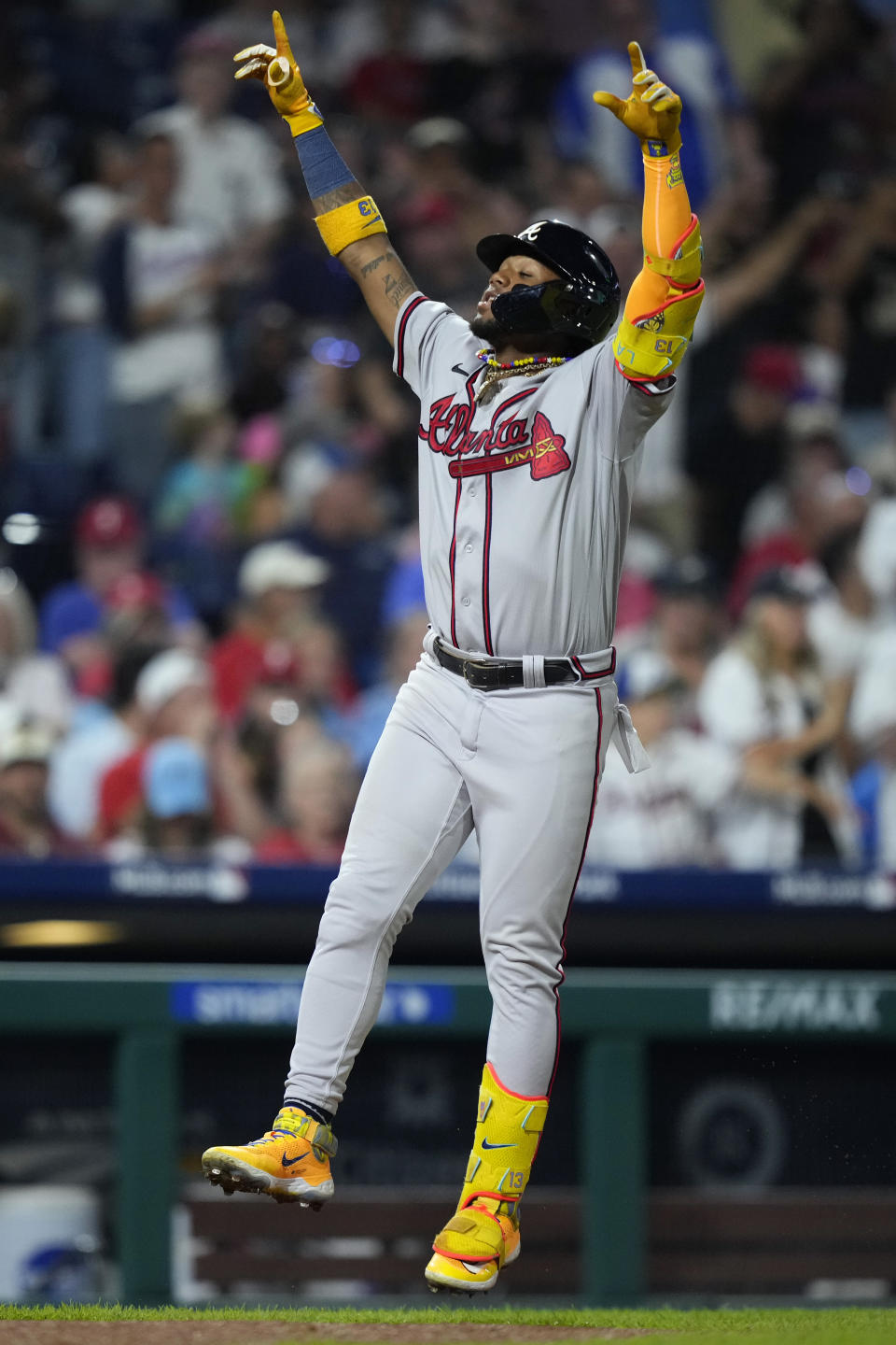 Atlanta Braves' Ronald Acuna Jr. reacts after hitting a two-run home run against Philadelphia Phillies pitcher Zack Wheeler during the fifth inning of a baseball game, Tuesday, Sept. 12, 2023, in Philadelphia. (AP Photo/Matt Slocum)